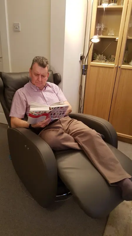 Husband relaxing and reading