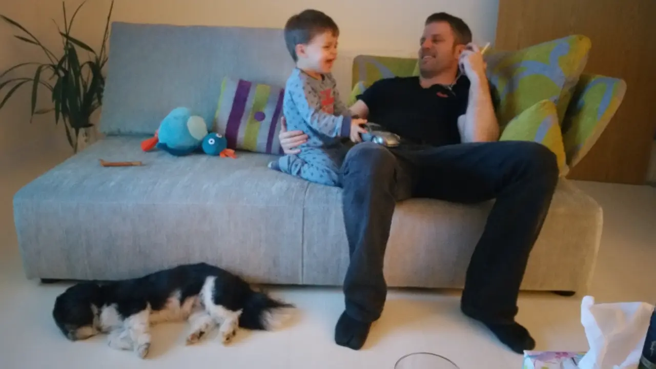 Toddler,dad and dog time :) while enjoying a glass of wine 