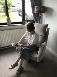 Christine enjoying our new fama chair