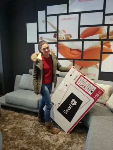Delivery of the TV to the winner of the 10th Photo Contest