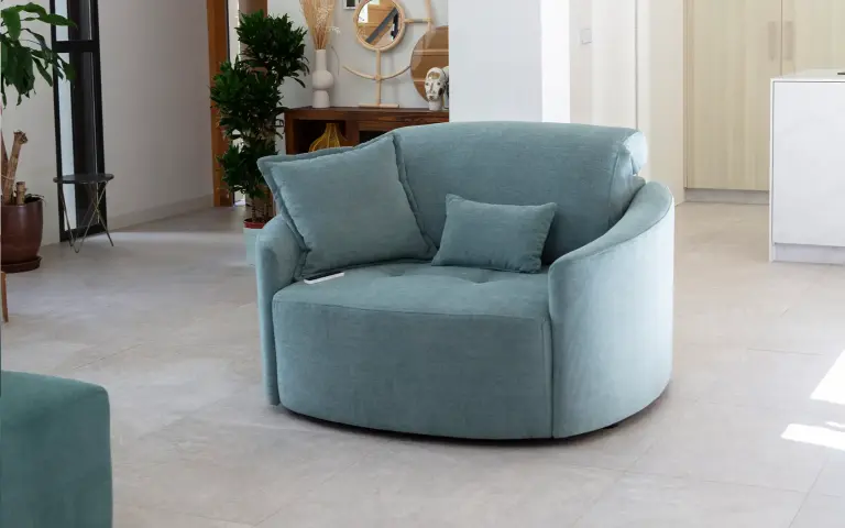 Sillón extraíble eléctrico Paradis Moon de Fama Sofás en color azul turquesa, ideal para leer o descansar con total comodidad